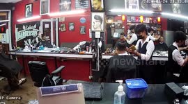 Russian tourist furious over his new haircut HACKS OFF barber's fringe in revenge