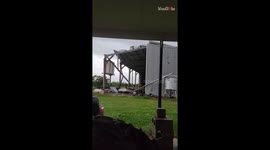 Brandon, Australia: Cyclone Kirrily effortlessly blows roof off a shed