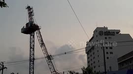 Crane collapses injuring workers at hospital construction site in Bangkok