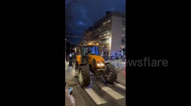Convoy of tractors driven by protesting farmers arrive in Brussels ahead of EU summit