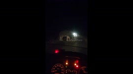 Elephant blocks road at night to steal food from trucks