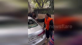 Female activists rescue three puppies locked inside owner's car for days