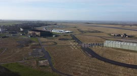 Dozens of portacabins set to house 2,000 asylum seekers line runway at former RAF base