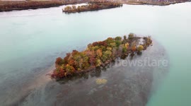 Beautiful Autumn drone video of island with fall colors