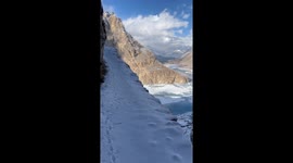 Jaw dropping cliff side path way in the snow at attabad lake in Hunza Pakistan