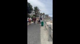 Homeless Man Eats A Rat