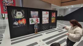 Visitors at the Art Exhibition of the Year of the Dragon at the Shanghai Library in China