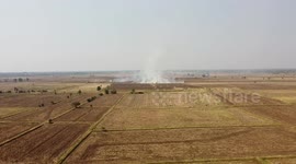 Thai farmers seen burning waste crops despite smoke shrouding Thailand