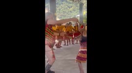 Tattoo artist, 107, dances with tourists in the Philippines