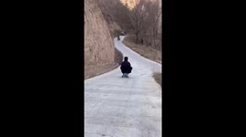 Man flips over and falls into ravine while driving cart downhill