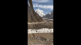 K2 is a savage mountain that tries to kill you - Majestic reveal from Helicopter over Baltoro Glacier