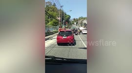 Swedish tourists fined for partying on car roof while driving