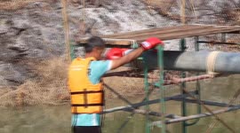 Villagers square off in amusing water boxing match for Thai festival