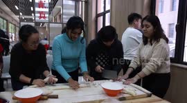 Overseas students celebrate traditional Chinese Xiaonian festival in N China