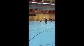 High jump mishap: pole vaulter misses landing zone, lands safely on side cushion