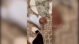 Baby can whistle at just eight months old