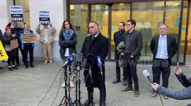 Greta Thunberg’s lawyer gives a statement outside court as the activist is acquitted