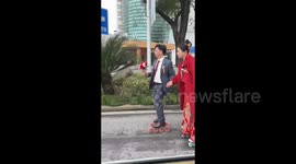 The bride and groom on roller skates in Yichun, China