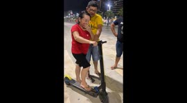 Scooterist Kisses Concrete