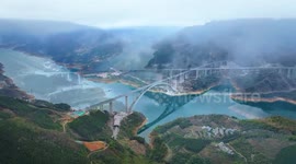 Expansive arch bridge in China's Guangxi opens to traffic