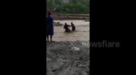 Thrilling triumph: motorbike conquers flooded river in Limot, Tarragona, Davao Oriental