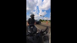 Cop Revs Engines With Motorcyclist
