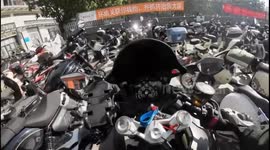 Good intentions gone awry at the motorbike parking in Zhongshan, China