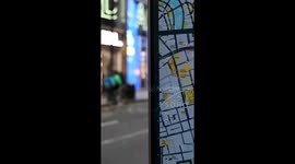 People heading into the busy area of Soho on a Bus, London, United Kingdom