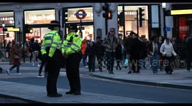 Police ladies walking within Oxford Circus on a Sunday during the Palestine and Jewish War