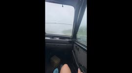 Couple Clever Solution to Broken Windshield Wipers