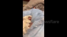 Chinese father sends his baby to sleep in record time