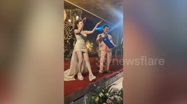 Thai couple spray guests with laughing gas at bizarre wedding recpetion