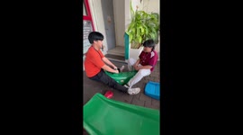 Big kids break toy crocodile seesaw