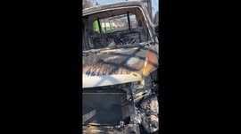 Tragic aftermath: burnt cars litter highway as deadly forest fires engulf Villa Independencia