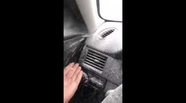 Motorist panicked as snow blows through air-con vent inside vehicle
