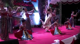 Child dancers contort themselves to fit on small trays in Thailand