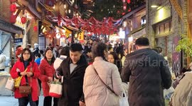Tourists Visit the Traditional Style Shibati Area in Chongqing, China