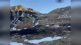 Helicopter Video Captures Firefighters Battling Bushfire on Mountain Cusna in Italy