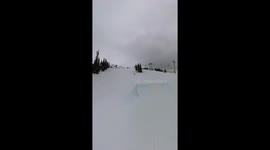 Snowboarder Overshoots The Jump