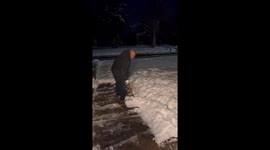 US homeowner uses flamethrower to melt snow on his drive