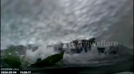 Chinese motorist narrowly averts incident as snow cascading from car roof blocks highway view