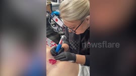 Mum survived cancer and now tattoos over women's mastectomy scars for free