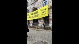 Greenpeace activists scale Unilever's London HQ in plastic pollution protest