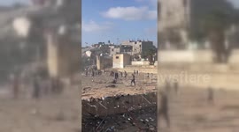 Palestinians Inspect Results Of Israeli Attack
