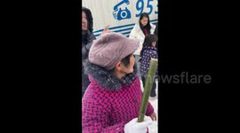China: Good Samaritans Bring Warmth And Food To Stranded Drivers Amid Snowstorm