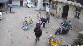 Men accidentally damage cars with firecrackers in China