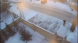 Surveillance video captures Volkswagen accident: elderly man hit while clearing snow