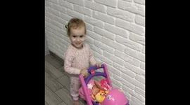 Adorable bond: Sofia's playtime delight with cat Kopychka in Ivano-Frankivsk