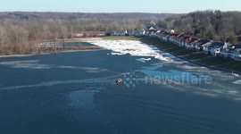 Michigan firefighters rescue two deer trapped on frozen Grand Rapids Lake