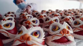 Lion-dragon shaped buns baked for upcoming Chinese New Year